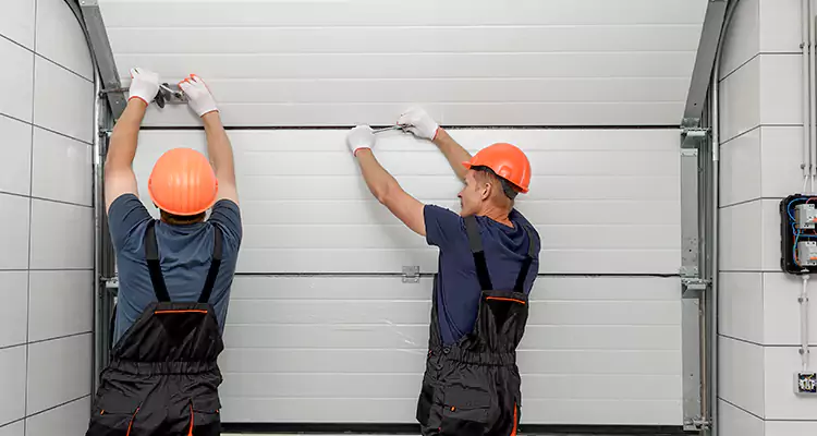 Garage Door Bottom Panel Repair in Carrollwood, FL
